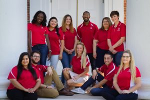 Graduate assistants in front of the lyceum